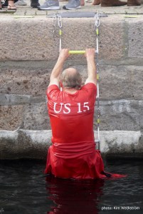 Vim syndicate head, Patrick Howaldt emerges from the water after a victory splash at the 2019 12mR European Championship!